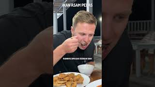 Laurence Benson eats IKAN ASAM PEDAS from Indonesia [upl. by Scholem]