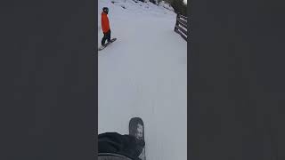 Snowboarding over a bridge on glacier road on Blackcomb mountain [upl. by Harelda]