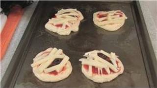 Halloween Treats  Scarily Scrumptious  How to Make Pizza Mummy Appetizers [upl. by Nol]