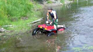 Honda 350 fourtrax 4x4 in the river [upl. by Enajyram39]