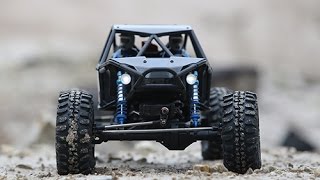 RC 4 Wheels Steering Axial Bomber RR10 slide on Ice frosty water and hill climbing sand rock [upl. by Hugon]