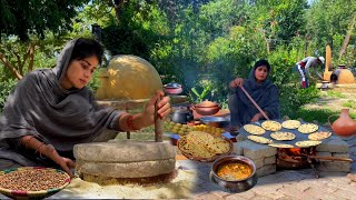 Grinding Gram Flour on Stone Mill and cooking Tawa Missi Bread with Handi Paneer in the Village Il [upl. by Ehcsrop]