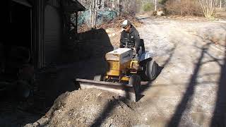 Gravely 432 with snow plow pushing gravel [upl. by Esimaj317]