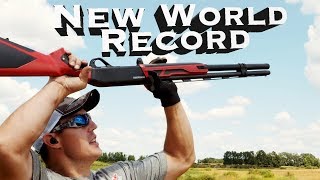 World Record 8 Clay Targets with Shotgun Over the Head  Gould Brothers [upl. by Anairotciv]