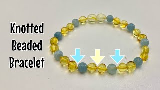 How to make a knotted bracelet  knotting between beads Amber pearl gemstones [upl. by Elehcir]