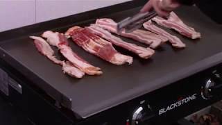 BLACKSTONE GRIDDLE SEASONING amp FIRST BACON COOK [upl. by Durno992]