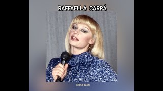 RAFFAELLA CARRÁ  CALIENTE CALIENTE LETRA [upl. by Qooraf457]