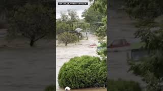 House floats through flooded streets in Asheville North Carolina after Hurricane Helene [upl. by Remmus90]