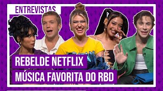 Rebelde Netflix elenco fala sobre casais LGBTQ música favorita do RBD e português [upl. by Yancy]