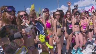 Hundreds of bikiniclad skiers take to the Russian slopes [upl. by Dylana]