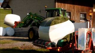 Siloballen wickeln mit John Deere 6430 [upl. by Arremat]