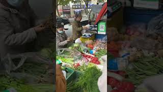 Mobile vendors selling fruits and vegetables on the streets of Xian usually at very cheap prices [upl. by Manouch]