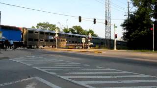 Southbound Metra commuter train crossing Dempster Street Morton Grove IL [upl. by Haslam556]