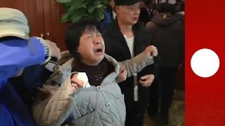 Malaysian plane shock Families of MH370 passengers react to news about crashed jet [upl. by Nnaeoj]