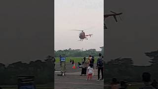 Schweizer S300 low flying helicopter above crowd helicopter aircraft [upl. by Omrellug682]