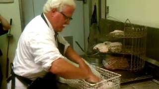 Colonel Sanders impersonator making chicken at the Clinton KFC [upl. by Okram]