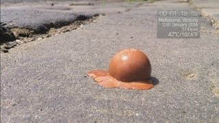 Timelapse Chocolate ball melts on ground in three minutes in Australias 42C heat [upl. by Cristin]