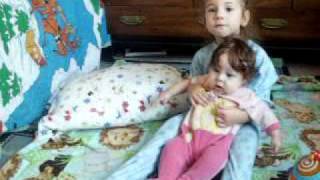 big sister rocking baby and singing made up song [upl. by Tera]