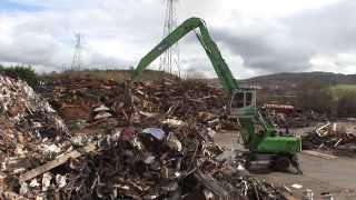 SENNEBOGEN  Scrap Handling 830 Mobile Material Handler loading scrap into shredder at SIMS UK [upl. by Knepper714]