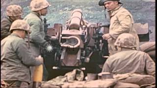 US Marines fire howitzer at Mount Suribachi on Iwo Jima during World War II CarrHD Stock Footage [upl. by Kale]