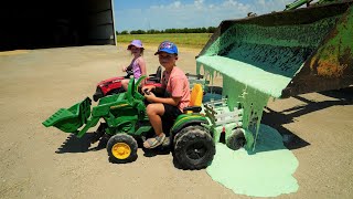 Dumping slime into kids tractors  Tractors for kids [upl. by Releyks497]