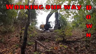 Clearing a steep slope in an attempt to build a road so we can build a crazy pond [upl. by Lapham]