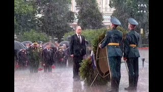 Putin braves rain to honor WWII victims [upl. by Neesay]