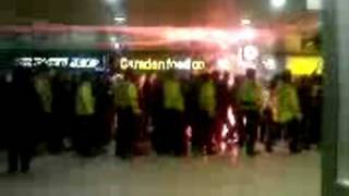 AJAX FANS misbehaving in Birmingham  Flares in New Street Station [upl. by Hakon438]