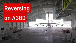 The art of reversing a Qantas A380 into a hangar [upl. by Mathi]