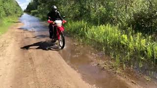 Honda CRF250L going through nature’s automatic car wash [upl. by Farron362]