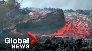 La Palma volcano Massive lava blocks tumble down mountain as molten rock cakes over island village [upl. by Wenonah]