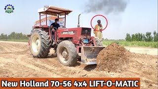 New Holland 7056 4x4 LIFTOMATIC Performance On Front Blade [upl. by Animrac]