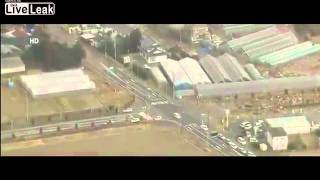 Aerial view of tsunami striking Sendai Japan [upl. by Maribelle]