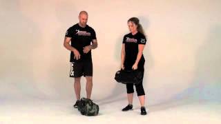 How to Properly Perform Ultimate Sandbag Training Power Clean [upl. by Ahsiyk117]