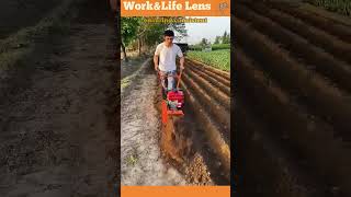 The farmer uses a rotary tiller to break soil create furrows and prepare for planting [upl. by Ihcur]