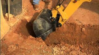 Cat® Backhoe Tool Attachment at Work [upl. by Bolten]