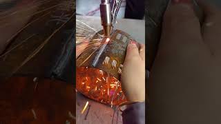 Handheld Laser Welder in Action  Factory Footage of Seamless Welding [upl. by Ruosnam]