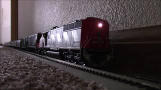 Aurora Miniatures SD60F Pulling Grain Train LHF [upl. by Grishilde]