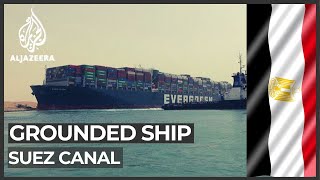 Suez Canal suspends traffic as tug boats work to free ship [upl. by Eened]