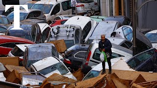 Valencia flood Drone footage reveals car graveyard as Spain announces new aid measures [upl. by Ahsei]