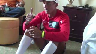 Ironman 703 New Orleans Chris McCormack killing some time with stretching before race day [upl. by Lanam]