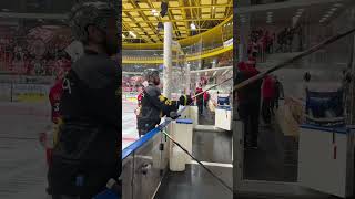 Hockey player is choosing his stick during the warm up [upl. by Enahs]