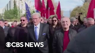 Albanian opposition leader Sali Berisha punched in the face during antigovernment protest [upl. by Neslund215]