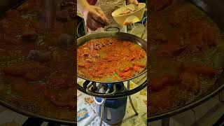 Adding vegetables to Paella [upl. by Heiney]