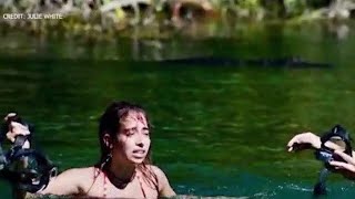 Alligator attack Gator bites womans head as shes snorkeling in Florida river [upl. by Ahsoym]