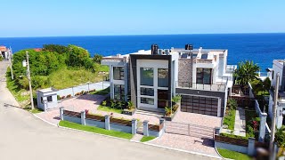 Touring an Ultra Modern Jamaica Beach House for Sale  St Mary Jamaica [upl. by Atinauj]