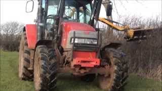 Hedge trimming with a Bomford hedge cutter [upl. by Enineg]