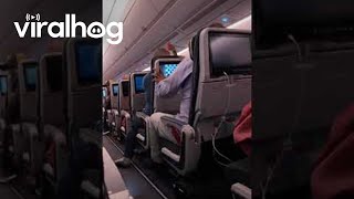 Airline Passenger Upset at Reclined Seat  ViralHog [upl. by Ayr]