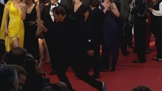 Quentin Tarantino dances on the red carpet as the cast of Pulp Fiction reunites in Cannes [upl. by Ordnael198]