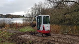 Finding Newts under a path with a Mini Digger Takeuchi TB216 Excavator [upl. by Elleahcim501]